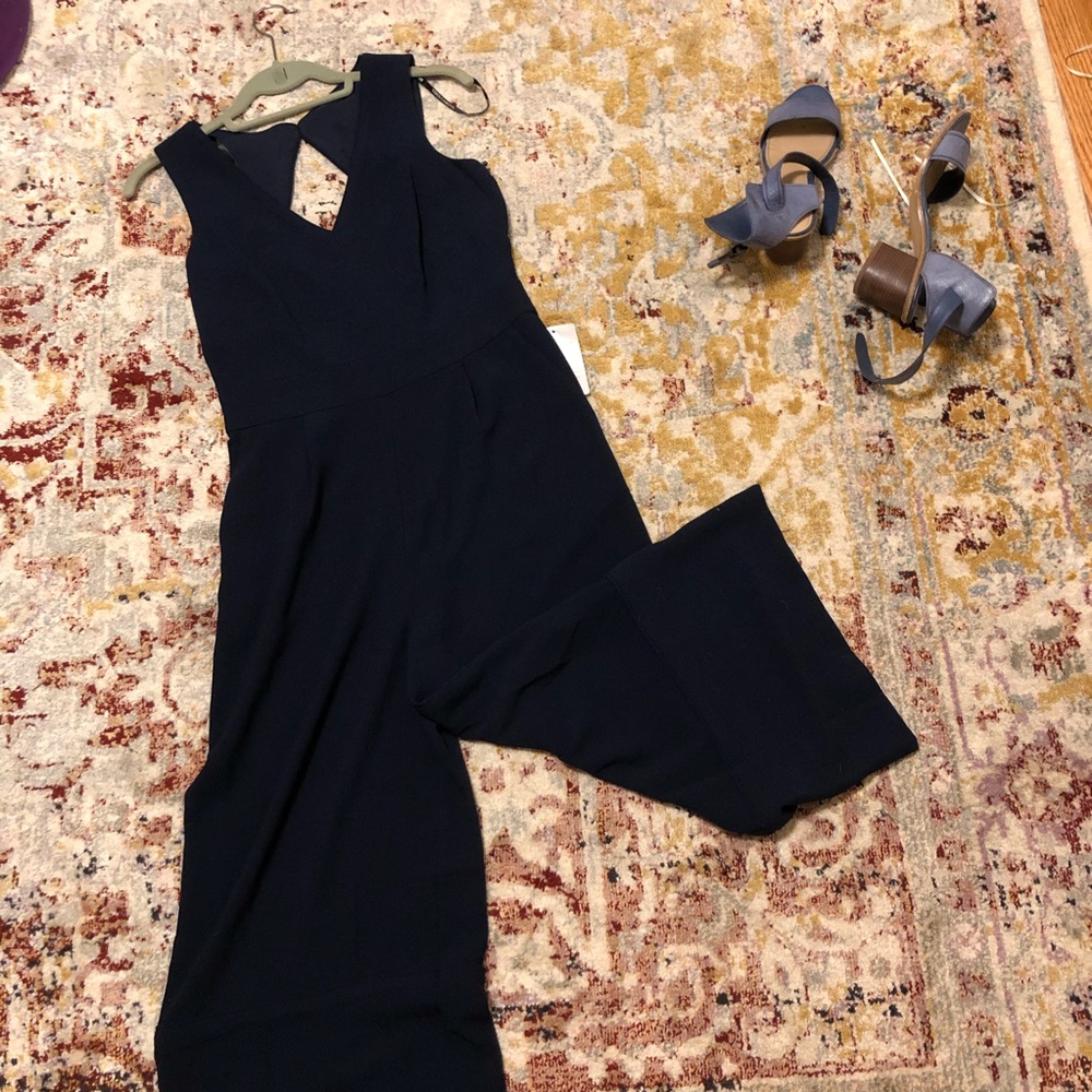 Vince Camuto flair cropped jumpsuit in navy. Very cute. Never worn with tags.